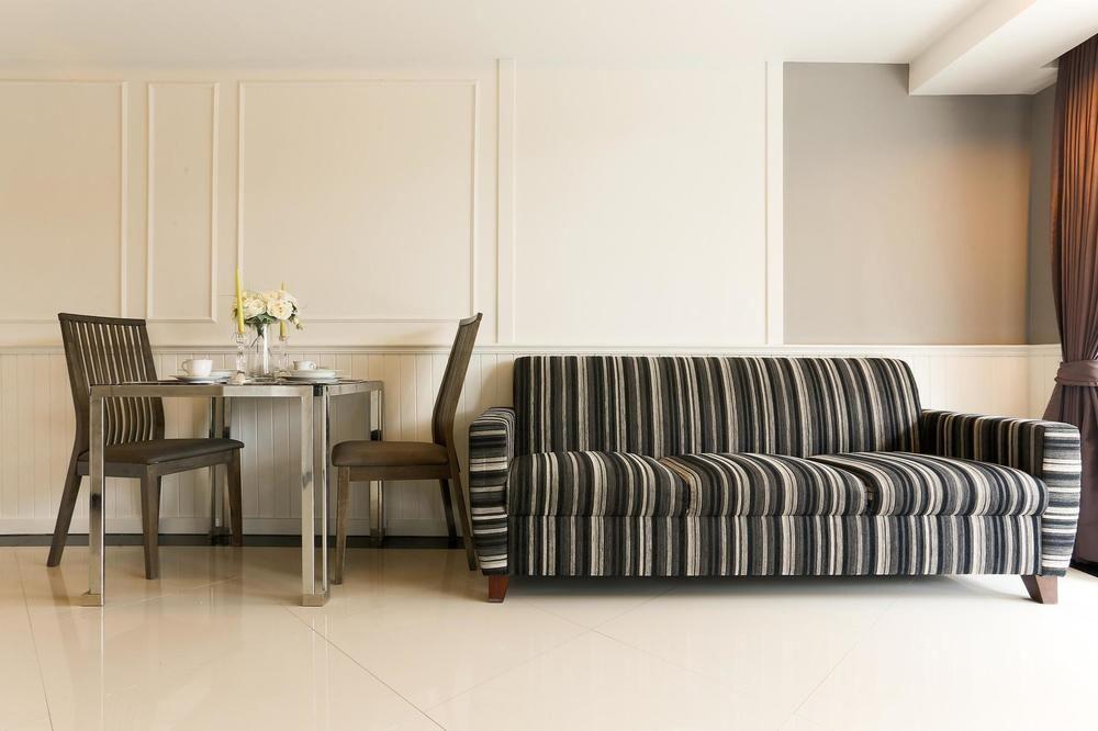 The Capital Resort @ Sukhumvit 50 Bangkok Exterior photo A WAINWRIGHT sofa