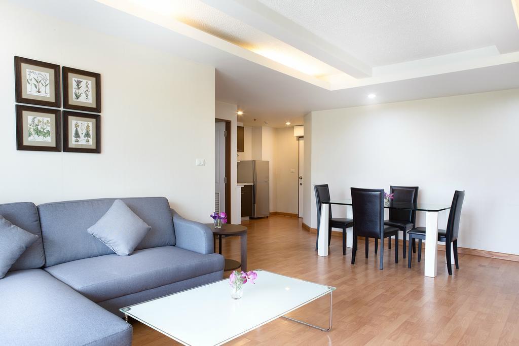 The Capital Resort @ Sukhumvit 50 Bangkok Exterior photo A living room in a serviced apartment in Bangkok, Thailand