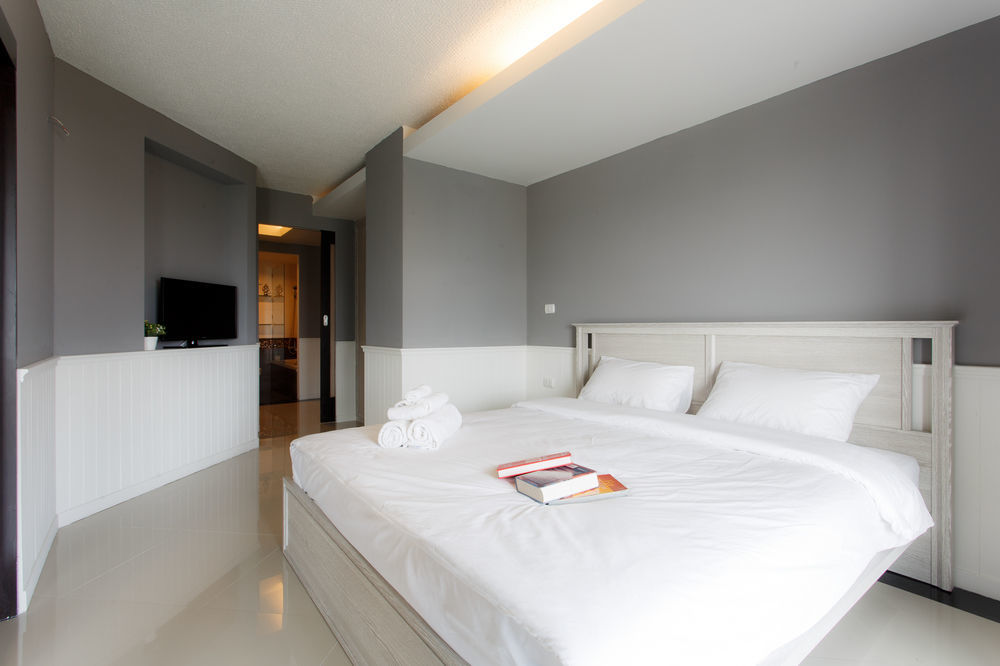 The Capital Resort @ Sukhumvit 50 Bangkok Exterior photo A bedroom in a hotel