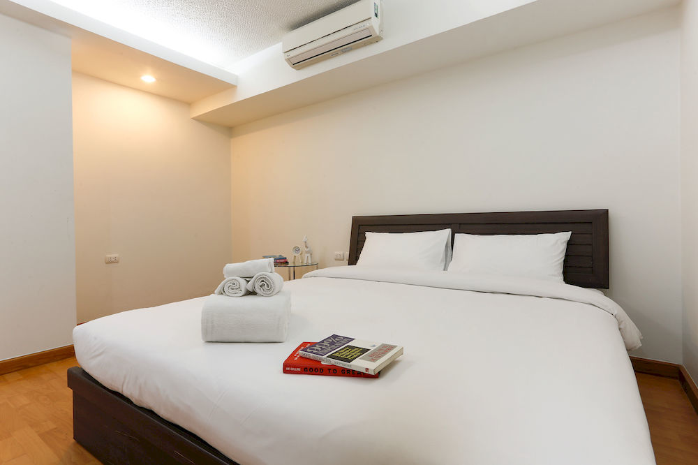 The Capital Resort @ Sukhumvit 50 Bangkok Exterior photo A bedroom at a hotel in Bangkok, Thailand